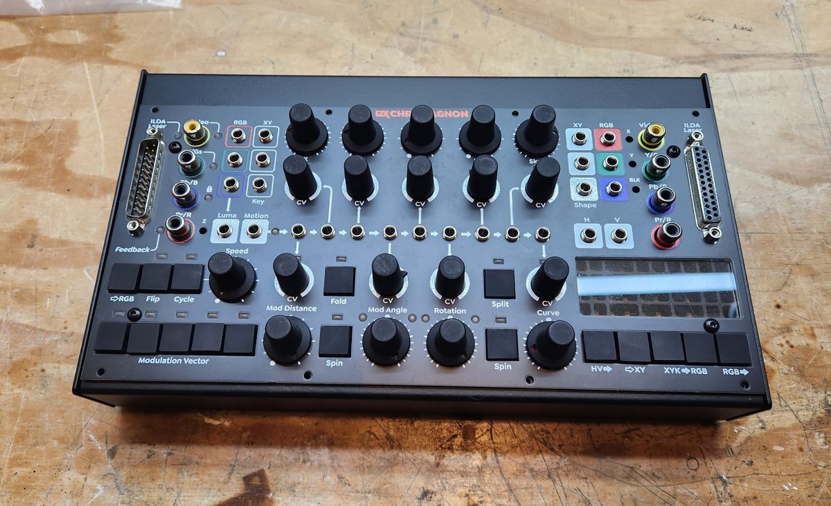 Chromagnon front panel with production knobs, mounted in its black sheet-metal enclosure